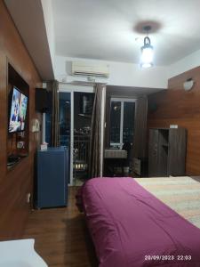 Grand Dhika Apartement by 2325 Studio room with cozy wooden style room