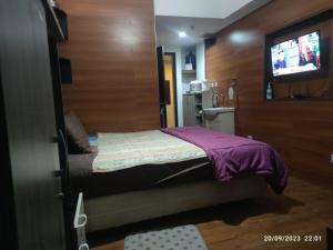 Grand Dhika Apartement by 2325 Studio room with cozy wooden style room