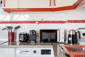 Peaceful 1 BDR Apartment W Balcony by LovelyStay