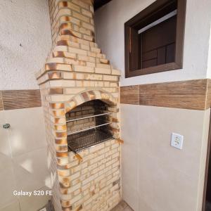 Casa térrea em condomínio à 450m da praia do Peró