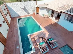 Casa com piscina em frente à Praia do Santinho - Inglêses