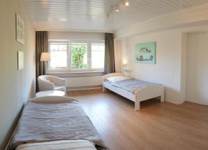 Ferienwohnung Brise 5, mit Spielscheune direkt am Wittensee