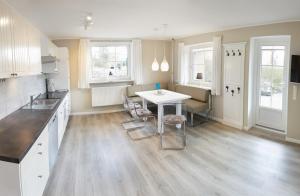 Ferienwohnung Seegras - mit Spielscheune, direkt am Wittensee