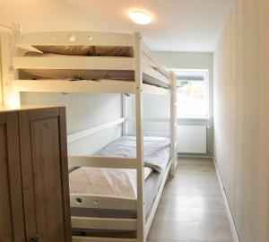 Ferienwohnung Waterkant direkt am Wittensee, mit Spielscheune