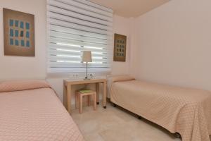 Apartamento con vistas al mar lateral en Torrox Costa