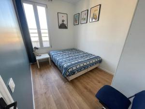 Appartements En face du Stade de France : photos des chambres