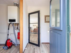 Cozy holiday home in Den Burg with hot tub