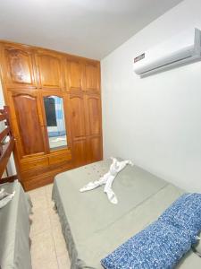 Apartamento en San Cristóbal con 2 habitaciones, 6 camas, sala, comedor, cocina, balcón privado, terraza con vista al mar, lavadora, internet satelital, cerca de bares y restaurantes - Sol y Mar, Galápagos Home