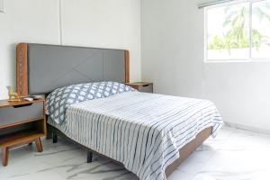 Apartamento con Alberca SmartTV y Jardin