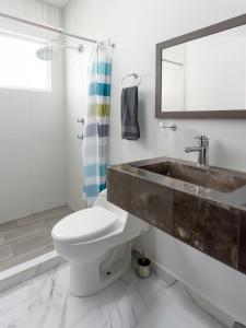 Apartamento con Alberca SmartTV y Jardin