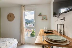 Appartements Les Cocons de Lourdes : photos des chambres