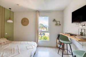 Appartements Les Cocons de Lourdes : photos des chambres