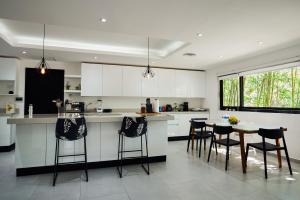 Villa de Lujo en Puerto Aventuras: Tu Refugio Privado en el Paraíso