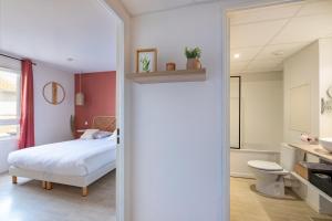 Appartements Les Cocons de Lourdes : photos des chambres