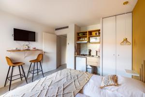 Appartements Les Cocons de Lourdes : photos des chambres