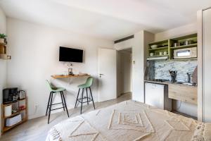 Appartements Les Cocons de Lourdes : photos des chambres