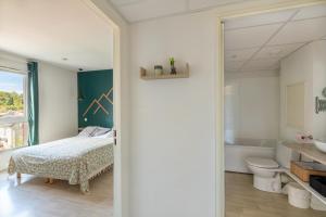 Appartements Les Cocons de Lourdes : photos des chambres