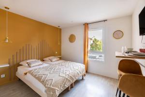 Appartements Les Cocons de Lourdes : photos des chambres