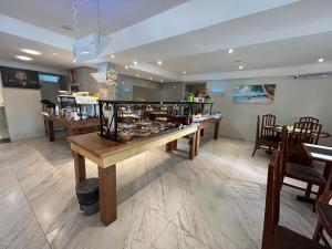 Riviera de São Lourenço Flat estúdio 110 Amarilis, 03 piscina climatizada, serviço de hotelaria, limpeza e troca de toalhas diária, carregador veiculo elétrico e serviço de praia finais de semana WiFi 500