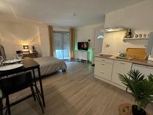 Appartements Appartement Cosy - Proche Abbaye aux Dames - WiFi : photos des chambres