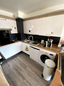 Appartements Logement cosy, situe entre ciel et mer : photos des chambres