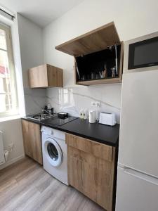 Appartements T1 Contemporain Proche du stade appart 101 : photos des chambres