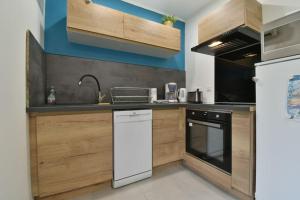 Appartements Appartement Le 16, 2 chambres, tout confort, avec terrain : photos des chambres