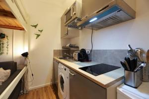 Appartements Le Petit Plus - studio confortable avec parking : photos des chambres