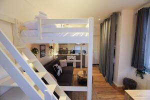 Appartements Le Petit Plus - studio confortable avec parking : photos des chambres