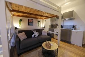 Appartements Le Petit Plus - studio confortable avec parking : photos des chambres