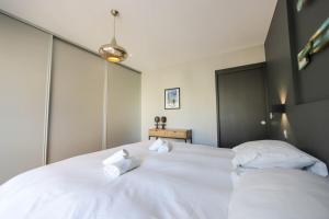Appartements Le Superbe - T4 avec parking a 5 min du lac - 4 : photos des chambres