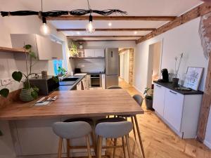 Appartements Appartement dans un corps de ferme alsacien : photos des chambres