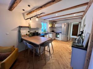 Appartements Appartement dans un corps de ferme alsacien : photos des chambres