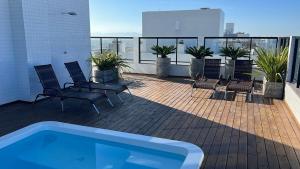 Ap 2 dormitórios com piscina a 4 quadras do mar Le Monde