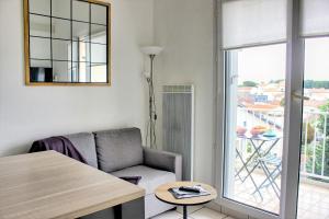 Appartements Le Clocher des Sables YourHostHelper : photos des chambres