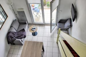 Appartements Le Clocher des Sables YourHostHelper : photos des chambres