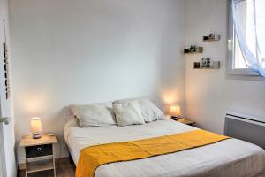 Appartements Le Clocher des Sables YourHostHelper : photos des chambres