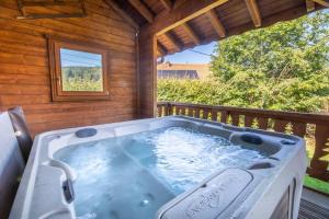 Chalets Les Griottes, veritable chalet de montagne, avec Jacuzzi et Sauna : photos des chambres