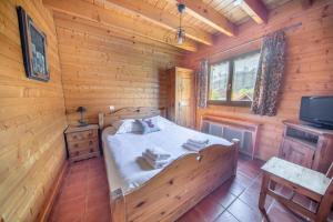 Chalets Les Griottes, veritable chalet de montagne, avec Jacuzzi et Sauna : photos des chambres