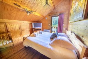 Chalets Les Griottes, veritable chalet de montagne, avec Jacuzzi et Sauna : photos des chambres