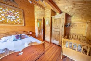 Chalets Les Griottes, veritable chalet de montagne, avec Jacuzzi et Sauna : photos des chambres