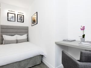Appartements LivinParis - Luxury 3 Bedrooms Grands-Boulevards I : photos des chambres