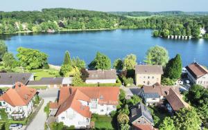 Snug Stays 1 I 3-Zimmer Design Apartment am See mit Garten I Home Office I Highspeed Wifi