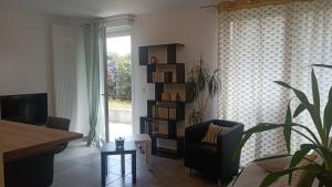 Appartements Charmant appartement rez de jardin ViaRhona : photos des chambres