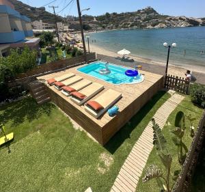 Beach front apartment with swimming pool