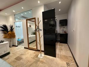 Appartements L-Ecrin de l-Amour : photos des chambres