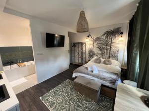 Appartements L'Ancillon Metz Gare Wifi Un-Sejour-a-Part : photos des chambres