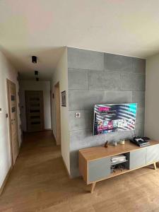 Przytulny apartament z dużym balkonem