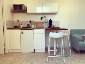 Appartements studio cosy idealement situe : photos des chambres