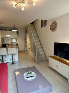 Appartements Le Jasmin Etoile - Duplex jardin proche Paris : photos des chambres